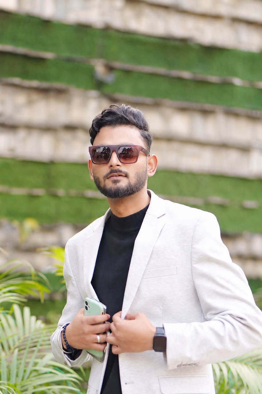 Piyush Kumar, founder of Grow With Piyush, in a light blazer and sunglasses
